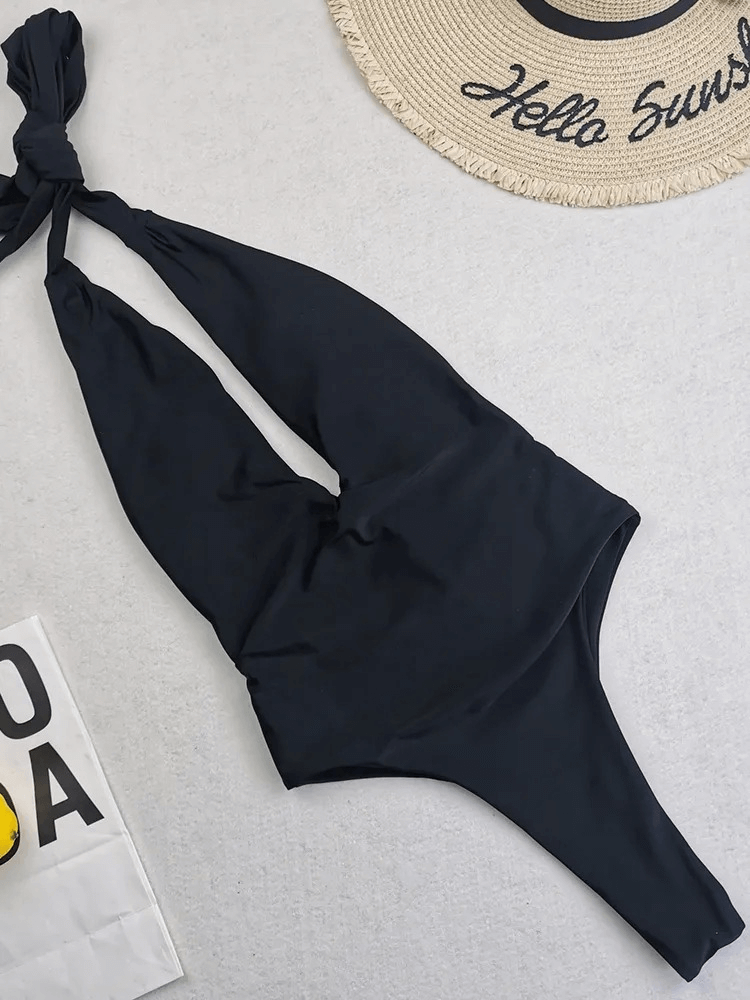 Sexy one piece swimsuit for women in black, open back design, made from durable nylon. Perfect for a stylish swim look. SF1723.
